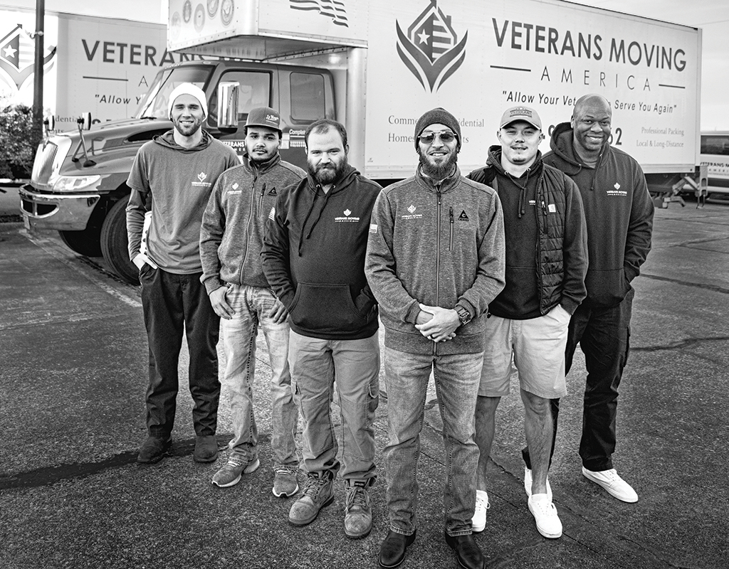 Veterans Moving America team in front of a moving truck